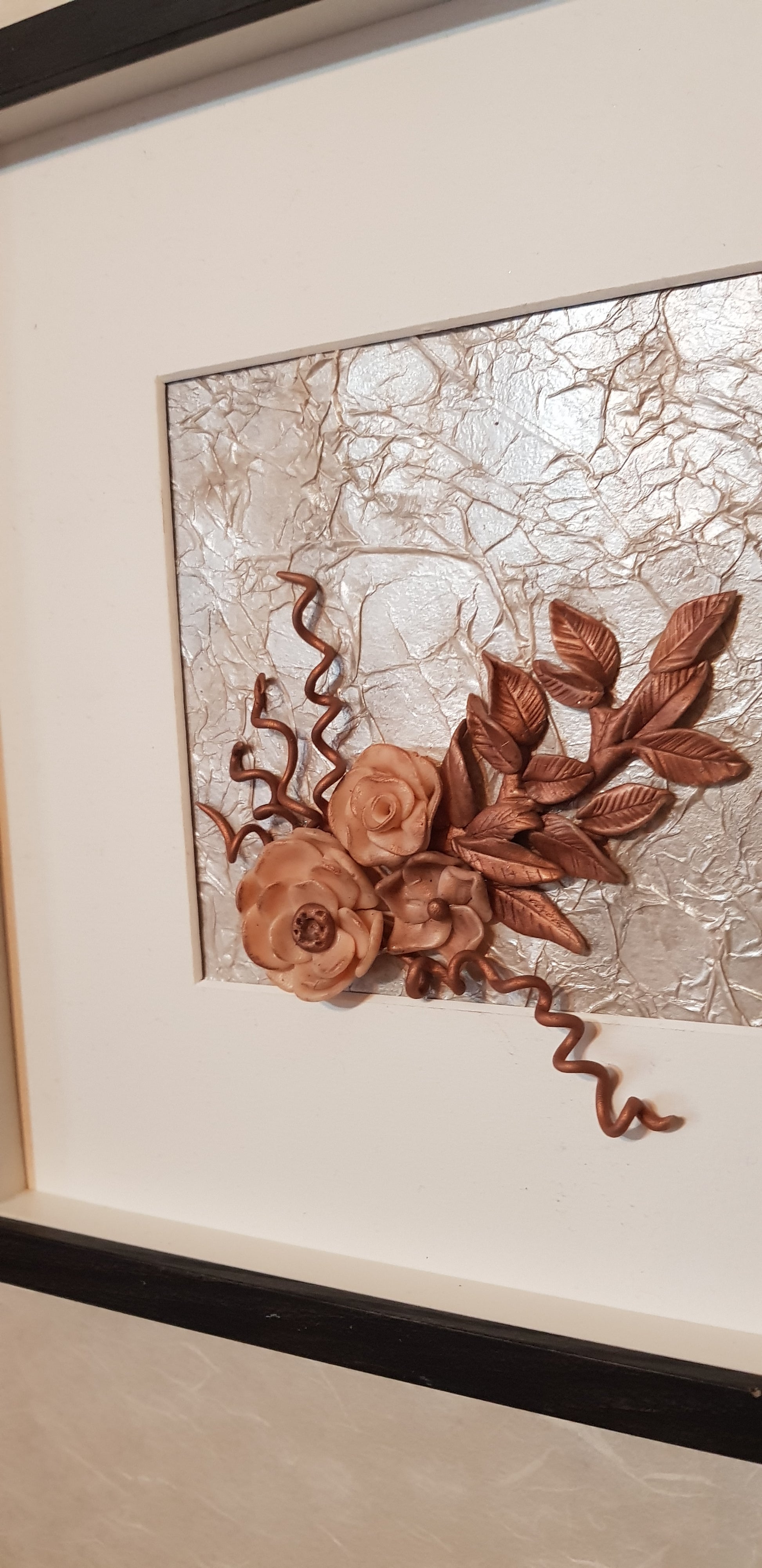 Handcrafted, bronze, 3D flowers wall decor made with polymer clay and a decoupage technique. Add a touch of glam to your walls with our unique piece "Bronze Spring".