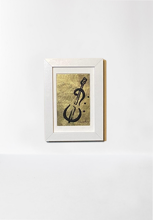 Handmade wall frame, featuring a 3D cello crafted with polymer clay on a golden painted canvas. The frame is white and made of wood.